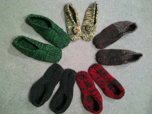 Lower two pairs are the Big Easy Slippers, and the others are Classic Slippers.