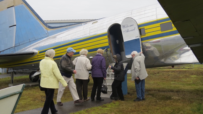 All bundled up against the weather, the Power Pioneers boarded the aircraft for their imaginary flight.