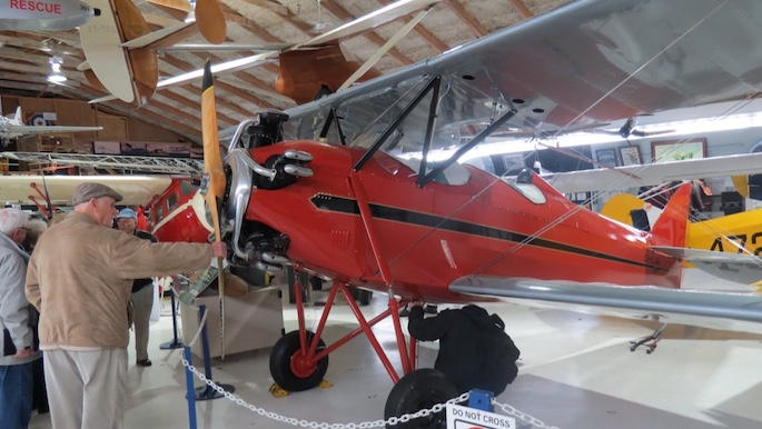 Former pilot Phil Miller liked the feel of the old wooden propeller on this biplane.
