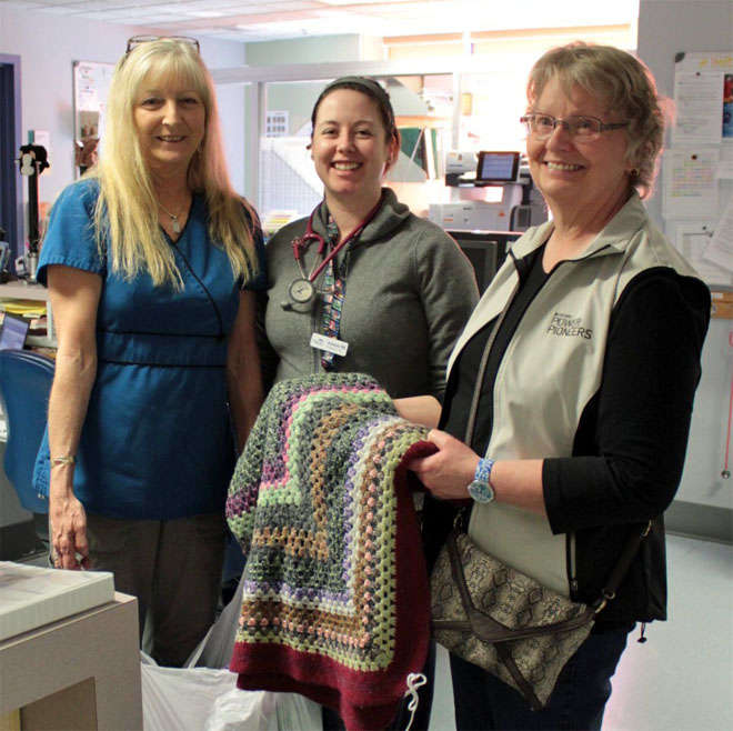 l to r: hospital staff members with Upper Island Caring Crafts Chair Vicki Gardner.