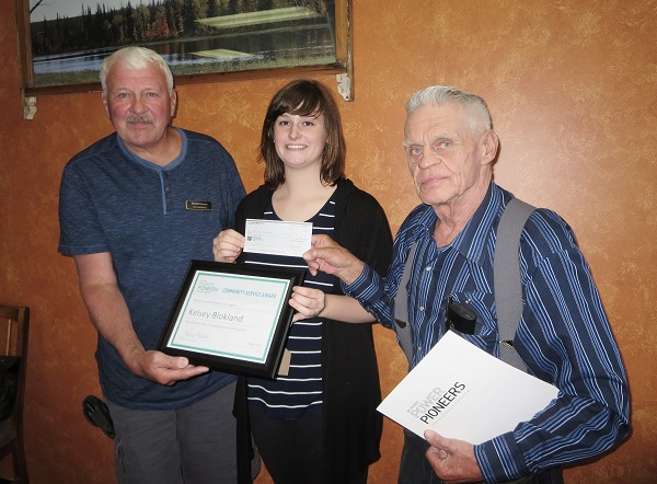  President of the Williams Lake Branch, Don Barnes and President of the 100 Mile House Branch, Dave Abbs, presented the $1000. award along with a framed certificate to Kelsey Blockland to commemorate her win of the Community Service Award for 2016.