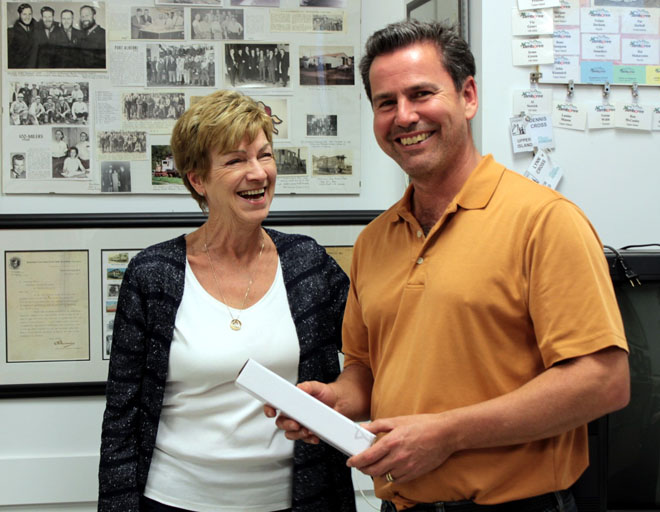 Enjoying a joke. Lois gifted Steve with a Power Pioneer LED flashlight, “for when the lights go out”!